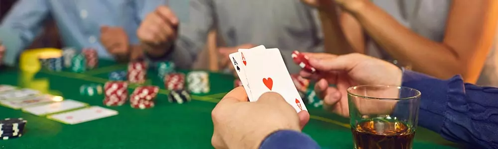 People sitting around a poker table